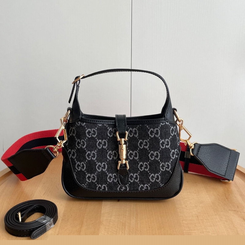 G*u*i top handle bags